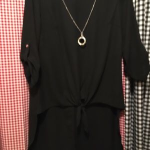 Beautiful black hi-low top. Size small.